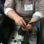 Cathy doing some repairs under the hood